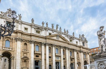 Vatican cathedral architecture Rome. / Vatican is christianity religious center. View at main cathedral facade and architecture in Rome Italy.