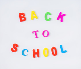 Colorful back to school alphabet letters on whiteboard 