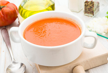 Andalusian gazpacho soup in white bowl