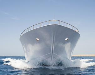 Bow of large motor yacht at sea