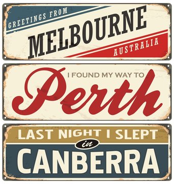 Vintage metal signs collection with Australian cities