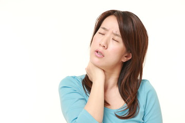 Fototapeta premium middle aged Japanese woman suffers from neck ache
