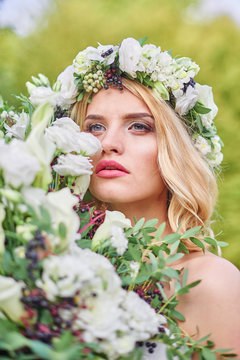Wedding . Beautiful bride. Love.Beautiful bride with a wreath on his head holding a bouquet. bride