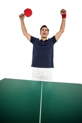 Happy male athlete posing after victory