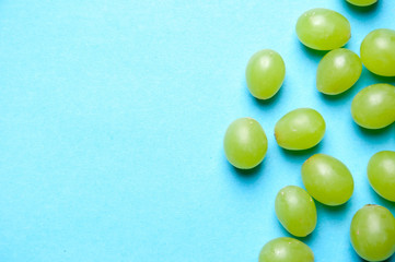 Balls of grapes as a background from above