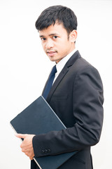 Portrait of young asian business man black suit holding laptop c