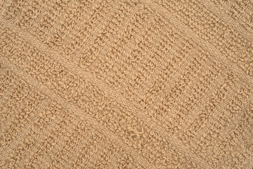Close view of a beige kitchen dish cloth