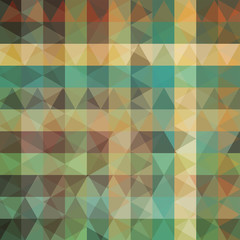 abstract background consisting of green, beige, brown triangles