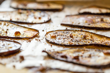 Tasty Grilled Eggplants with Garlic, Parsley and Olive Oil on a Grilling Pan, Healthy Food, Close-up