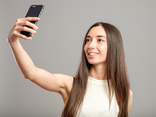 Naklejka premium Woman taking selfie