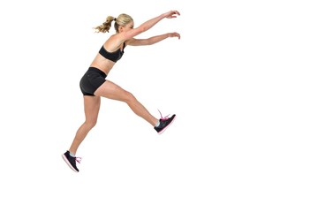 Fototapeta na wymiar Athletic woman exercising on white background