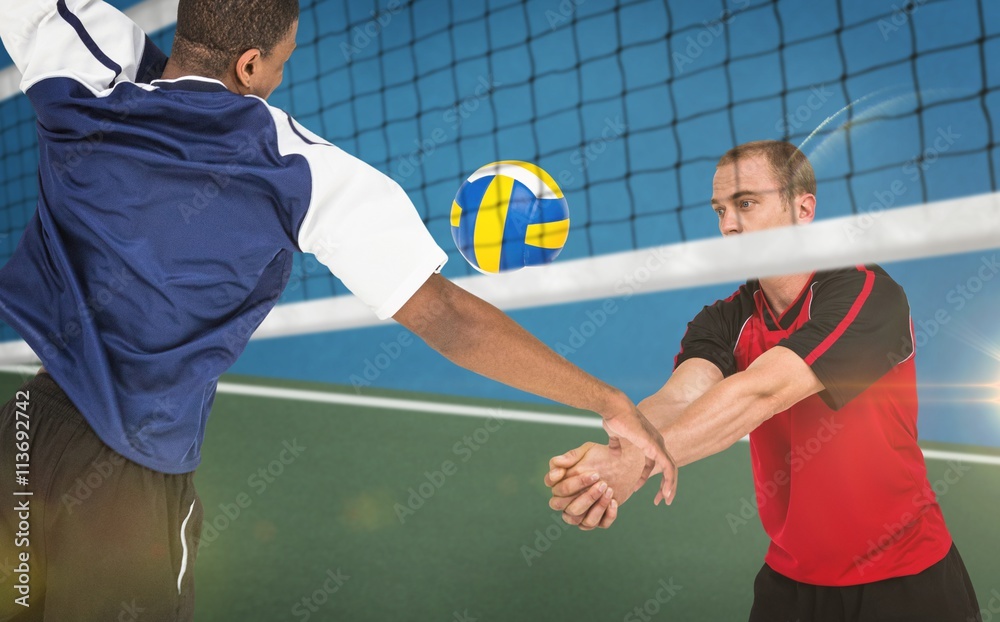 Canvas Prints Composite image of sportsmen are playing volleyball 