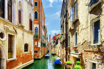 Fototapeta na wymiar View of the Rio di San Cassiano Canal with boats, Venice, Italy