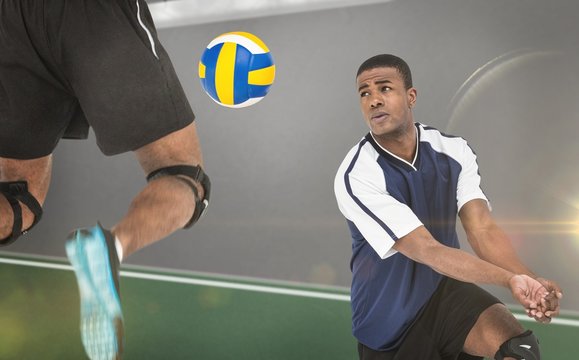 Composite image of sportsmen are playing volleyball 