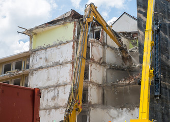 Dismantling of Building crashing by machinery