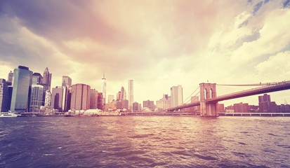 Vintage stylized Manhattan skyline with Brooklyn Bridge.