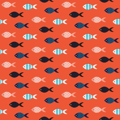 Obraz na płótnie Canvas Vector fish seamless pattern. School of fish in rows on coral red sea pattern. Summer marine theme for cards and textile.
