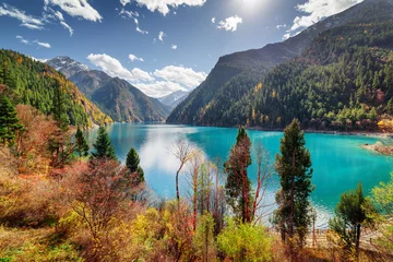 Zelfklevend Fotobehang Amazing view of the Long Lake with azure water among mountains © efired