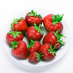 Strawberries on a white plate