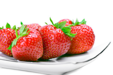 Strawberries on a white plate