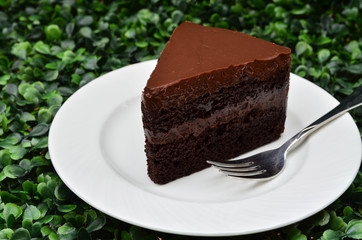 Delicious, soft sliced fresh homemade dark chocolate cake