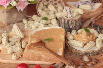 Peanut butter smeared on bread is delicious.