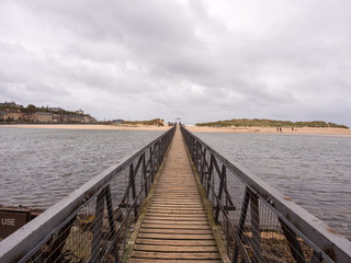 Fototapeta na wymiar Passenger bridge accross to the small island at Lossiemouth, Morray Firth, Scotland, UK,