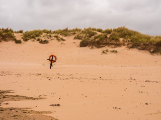 Fototapeta na wymiar Beautiful golden sands at Lossiemouth beach, Lossiemouth, Morray Firth, Scotland, UK,