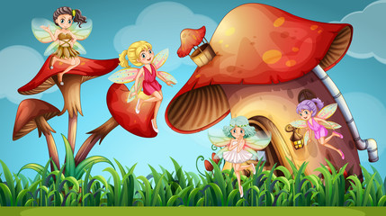 Fairies flying in the mushroom garden © GraphicsRF
