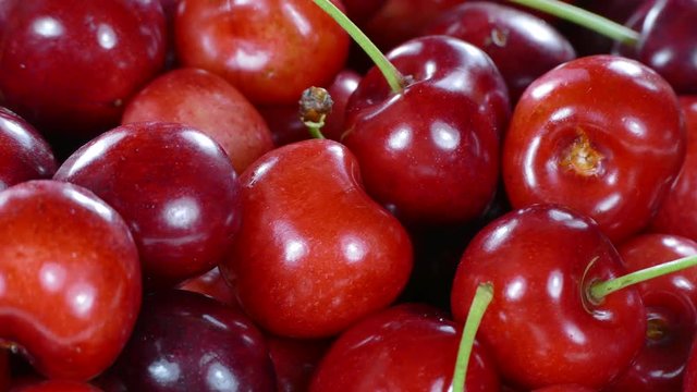 Cherry in basket rotating, close up, UHD