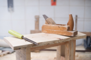 Carpenter tools on wood table background. Copy space