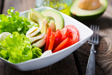 Fresh salad with vegetables and mozzarella