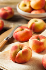 Fototapeta na wymiar Raw Organic Donut Saturn Peaches