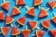 Watermelon slice popsicles on a blue rustic wood background, Pop