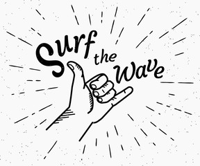 Retro grunge black and white illustration of human hand doing surfer shaka insignia with surf the wave handmade text. Hipster shaka label with sunburst rays engrave isolated on white background.