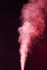 Naklejka premium Red vapor on the black background
