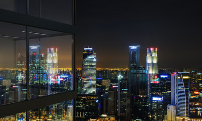 Fototapeta na wymiar Balcony with illuminated Singapore view