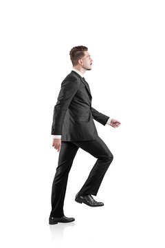 Walking Businessman In Suit Sideview