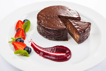 dessert with berries and sauce