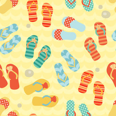 Seamless pattern with flip flops on a sand.
