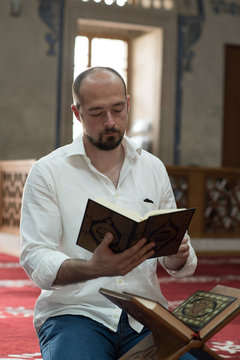Muslim reading Koran 