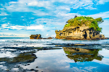 Tanah Lot Island temple is a sacred and very old Hindu temple in Bali, Indonesia. Seen here during...
