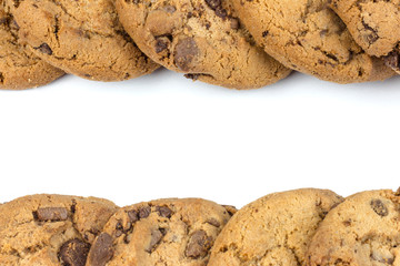 Glass of milk and cookies isolated on white
