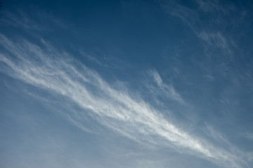 Fototapeta premium blurred cloud in the dark blue sky.