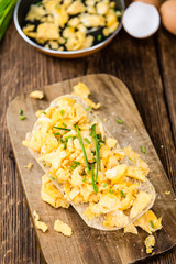 Scrambled Eggs on a bun (close-up shot)