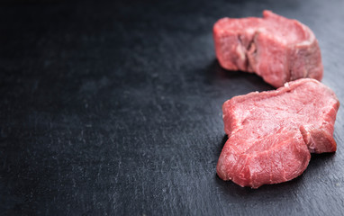 Raw Beef Fillet on a slate slab