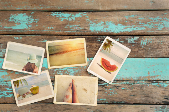 Photo album of journey honeymoon trip in summer on wood table. instant photo of vintage camera - vintage and retro style