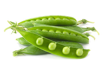 Young grean peas on white