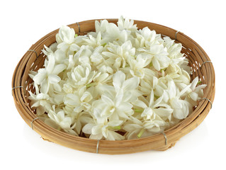 jasmine flowers in basket on white background