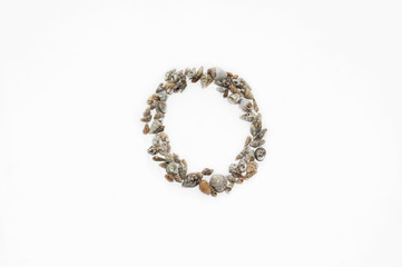 The letter "O" made from seashells